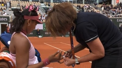 Naomi Osaka arrived at the court wearing a cute pink outfit with a sakura theme, which included flower hair clips and a frilly skirt. (X)