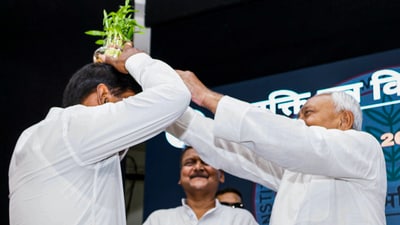 Bihar Chief Minister Nitish Kumar's act during the event garnered sharp criticism from RJD spokesperson Mrityunjay Tiwary. (PTI) Bihar Chief Minister Nitish Kumar's act during the event garnered sharp criticism from RJD spokesperson Mrityunjay Tiwary. (PTI)