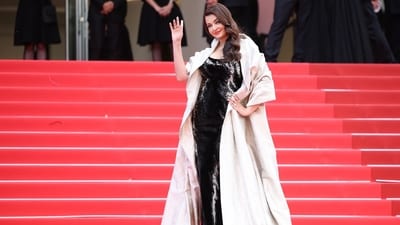 Aishwarya Rai Bachchan arrives for the screening of the film "La venue de l'avenir" (Colors of Time) at the 78th edition of the Cannes Film Festival. (AFP)