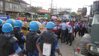 The agitation follows an incident on May 20, when a Manipur State Transport bus ferrying journalists to Ukhrul for the Shirui Lily Festival was stopped by central security personnel and ordered to remove the word “Manipur”. (HT Photo) The agitation follows an incident on May 20, when a Manipur State Transport bus ferrying journalists to Ukhrul for the Shirui Lily Festival was stopped by central security personnel and ordered to remove the word “Manipur”. (HT Photo)