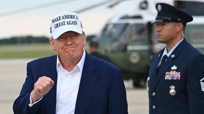 US President Donald Trump makes a fist as he disembarks from Air Force One upon arrival at Joint Base Andrews in Maryland, May 25, 2025, after spending the weekend in New Jersey. (AFP) US President Donald Trump makes a fist as he disembarks from Air Force One upon arrival at Joint Base Andrews in Maryland, May 25, 2025, after spending the weekend in New Jersey. (AFP)