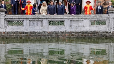 France's President Emmanuel Macron, his wife Brigitte Macron (C-L), Vietnam's General Secretary of the Communist Party To Lam and his wife Ngo Phuong Ly (C-R) visit the Temple of Literature in Hanoi on May 26, 2025. (Photo by Ludovic MARIN / AFP) (AFP) France's President Emmanuel Macron, his wife Brigitte Macron (C-L), Vietnam's General Secretary of the Communist Party To Lam and his wife Ngo Phuong Ly (C-R) visit the Temple of Literature in Hanoi on May 26, 2025. (Photo by Ludovic MARIN / AFP) (AFP)