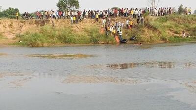 Villagers gather at the spot where two men drowned after jumping into the river in Rajasthan’s Dholpur district Villagers gather at the spot where two men drowned after jumping into the river in Rajasthan’s Dholpur district