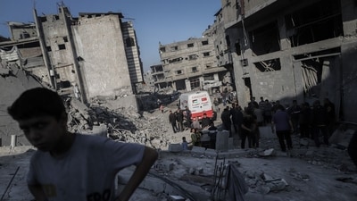 Residents and emergency service workers search the rubble following an Israeli airstrike at a refugee camp in Jabaliya, northern Gaza, on Friday, May 23, 2025. (Bloomberg) Residents and emergency service workers search the rubble following an Israeli airstrike at a refugee camp in Jabaliya, northern Gaza, on Friday, May 23, 2025. (Bloomberg)