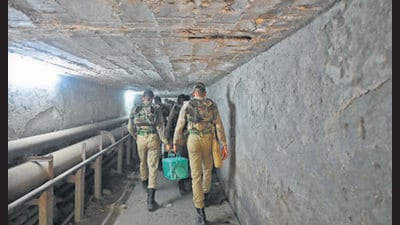 the soldiers are forced to take a path straddling a stench-filled drain under a culvert on a busy stretch of the Ring Road (HT Photo) the soldiers are forced to take a path straddling a stench-filled drain under a culvert on a busy stretch of the Ring Road (HT Photo)