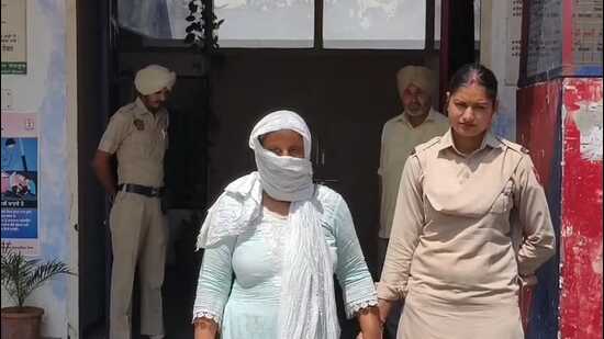 The woman identified as Sumiti, a Ludhiana resident, in police custody on Monday. (HT)