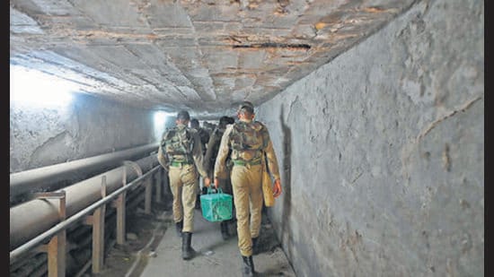 the soldiers are forced to take a path straddling a stench-filled drain under a culvert on a busy stretch of the Ring Road (HT Photo)