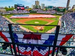 A large American flag is seen across the outfield prior to a game between the Colorado Rockies and the Chicago Cubs on Memorial Day at Wrigley Field. Mandatory Credit: Patrick Gorski-Imagn Images