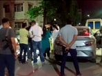 Panchkula: Police and officials investigate at the site after seven members of a family from Dehradun allegedly consumed poison and died in a car. Panchkula: Police and officials investigate at the site after seven members of a family from Dehradun allegedly consumed poison and died in a car.