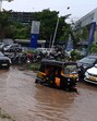 The advancement was accompanied by heavy rainfall in parts of the Pune district, especially in the ghat regions, bringing waterlogging, tree-fall incidents, and power outages in several areas. (MAHENDRA KOLHE/ HT) The advancement was accompanied by heavy rainfall in parts of the Pune district, especially in the ghat regions, bringing waterlogging, tree-fall incidents, and power outages in several areas. (MAHENDRA KOLHE/ HT)
