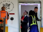 Emmanuel Macron described the moment as one of him teasing his wife and called out people for attributing “nonsense” around it.