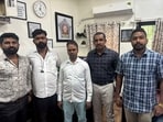 The Mumbai police have taken into custody the suspect (in the centre) who allegedly made a bomb threat to Mumbai airport The Mumbai police have taken into custody the suspect (in the centre) who allegedly made a bomb threat to Mumbai airport