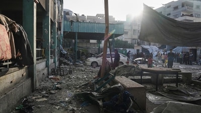 Palestinians inspect the damage at school used as a shelter by displaced residents that was hit by Israeli military strike and killed at least 36 people, in Gaza City, on Monday, May 26, 2025. AP/PTI(AP05_26_2025_000199B) (AP) Palestinians inspect the damage at school used as a shelter by displaced residents that was hit by Israeli military strike and killed at least 36 people, in Gaza City, on Monday, May 26, 2025. AP/PTI(AP05_26_2025_000199B) (AP)