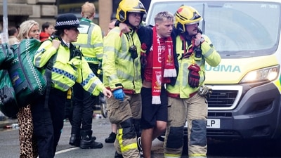 In a startling event, a car crashed into a sizable throng during Monday's Liverpool victory parade celebration, injuring over 50 people and sending 27 to the hospital. A 53-year-old British driver has been taken into custody. (AP) In a startling event, a car crashed into a sizable throng during Monday's Liverpool victory parade celebration, injuring over 50 people and sending 27 to the hospital. A 53-year-old British driver has been taken into custody. (AP)