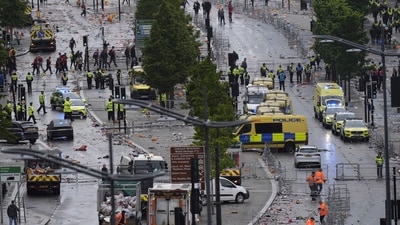 Police and emergency personnel deal with an incident on Water Street near the Liver Building in Liverpool after a car collided with pedestrians during the Premier League winners parade, in Liverpool, England, Monday May 26, 2025. AP/PTI(AP05_27_2025_000040A) (AP) Police and emergency personnel deal with an incident on Water Street near the Liver Building in Liverpool after a car collided with pedestrians during the Premier League winners parade, in Liverpool, England, Monday May 26, 2025. AP/PTI(AP05_27_2025_000040A) (AP)