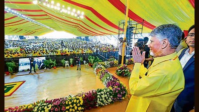 Andhra Pradesh Chief Minister N Chandrababu Naidu greets the gathering at the Telugu Desam Party's (TDP) three-day annual Mahanadu conclave, in Kadapa on Tuesday. (ANI)