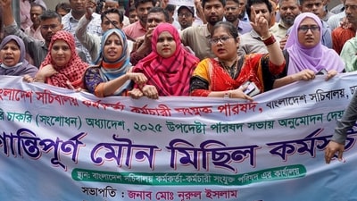 Civil officials protest inside the Secretariat building in Dhaka on May 25, 2025, demanding the repeal of a government order giving it greater power to sack employees for disciplinary breaches. Splits between Bangladesh's national tax authority and the interim government over new rules escalated May 25, extending a two week long strike that has reportedly resulted in millions of dollars of taxes go uncollected. (Photo by AFP) (AFP) Civil officials protest inside the Secretariat building in Dhaka on May 25, 2025, demanding the repeal of a government order giving it greater power to sack employees for disciplinary breaches. Splits between Bangladesh's national tax authority and the interim government over new rules escalated May 25, extending a two week long strike that has reportedly resulted in millions of dollars of taxes go uncollected. (Photo by AFP) (AFP)
