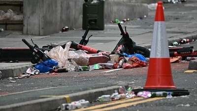 Discarded electric scooters lay in the road behind a police cordon on Water Street in Liverpool, north-west England on May 27, 2025, after a car ploughed in to crowds gathered to watch an open-top bus victory parade for Liverpool's Premier League trophy parade on May 26. Police said Monday they were not treating a Liverpool car ramming which left 27 people hospitalised as terrorism, after a vehicle ploughed into crowds celebrating Liverpool's Premier League football title. "We believe this to be an isolated incident, and we are not currently looking for anyone else in relation to it," Merseyside Police Assistant Chief Constable Jenny Sims told a press conference, adding a 53-year-old British man had been arrested. (Photo by Paul ELLIS / AFP) (AFP) Discarded electric scooters lay in the road behind a police cordon on Water Street in Liverpool, north-west England on May 27, 2025, after a car ploughed in to crowds gathered to watch an open-top bus victory parade for Liverpool's Premier League trophy parade on May 26. Police said Monday they were not treating a Liverpool car ramming which left 27 people hospitalised as terrorism, after a vehicle ploughed into crowds celebrating Liverpool's Premier League football title. "We believe this to be an isolated incident, and we are not currently looking for anyone else in relation to it," Merseyside Police Assistant Chief Constable Jenny Sims told a press conference, adding a 53-year-old British man had been arrested. (Photo by Paul ELLIS / AFP) (AFP)