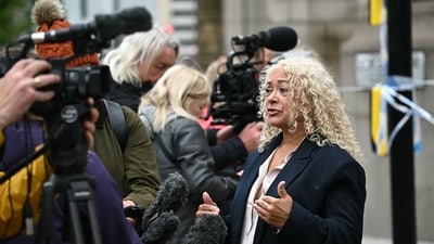 Labour MP for Liverpool Riverside, Kim Johnson, talks to members of the media beside a police cordon on Water Street in Liverpool, north-west England on May 27, 2025, after a car ploughed in to crowds gathered to watch an open-top bus victory parade for Liverpool's Premier League trophy parade on May 26. Police said Monday they were not treating a Liverpool car ramming which left 27 people hospitalised as terrorism, after a vehicle ploughed into crowds celebrating Liverpool's Premier League football title. "We believe this to be an isolated incident, and we are not currently looking for anyone else in relation to it," Merseyside Police Assistant Chief Constable Jenny Sims told a press conference, adding a 53-year-old British man had been arrested. (Photo by Paul ELLIS / AFP) (AFP) Labour MP for Liverpool Riverside, Kim Johnson, talks to members of the media beside a police cordon on Water Street in Liverpool, north-west England on May 27, 2025, after a car ploughed in to crowds gathered to watch an open-top bus victory parade for Liverpool's Premier League trophy parade on May 26. Police said Monday they were not treating a Liverpool car ramming which left 27 people hospitalised as terrorism, after a vehicle ploughed into crowds celebrating Liverpool's Premier League football title. "We believe this to be an isolated incident, and we are not currently looking for anyone else in relation to it," Merseyside Police Assistant Chief Constable Jenny Sims told a press conference, adding a 53-year-old British man had been arrested. (Photo by Paul ELLIS / AFP) (AFP)