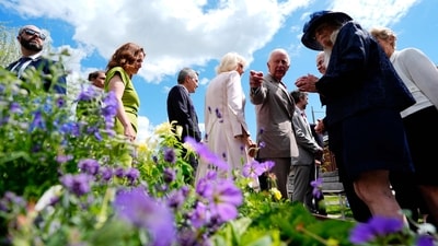 Britain's King Charles III and Queen Camilla are shown the Civc Gardens, an example of Ottawa's horticultural heritage, in Lansdowne Park in Ottawa, Canada, May 26, 2025. The 76-year-old monarch, who is also Canada's head of state as part of the Commonwealth, has never publicly commented on the ambitions of the US president, a noted admirer of the royal family. (Photo by Justin Tang / AFP) (AFP) Britain's King Charles III and Queen Camilla are shown the Civc Gardens, an example of Ottawa's horticultural heritage, in Lansdowne Park in Ottawa, Canada, May 26, 2025. The 76-year-old monarch, who is also Canada's head of state as part of the Commonwealth, has never publicly commented on the ambitions of the US president, a noted admirer of the royal family. (Photo by Justin Tang / AFP) (AFP)