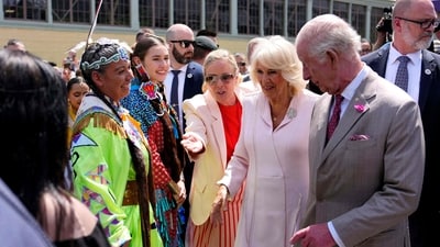 Britain's King Charles III and Queen Camilla meet performers at a community gathering at Lansdowne Park in Lansdowne Park in Ottawa, Canada, May 26, 2025. (AFP) Britain's King Charles III and Queen Camilla meet performers at a community gathering at Lansdowne Park in Lansdowne Park in Ottawa, Canada, May 26, 2025. (AFP)