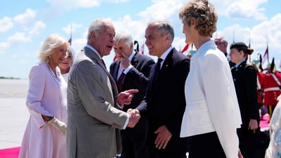 Britain's King Charles III and Britain's Queen Camilla are greeted by Canada's Prime Minister Mark Carney and his wife Diana Fox Carney (R), after they landed at Macdonald-Cartier International Airport in Ottawa, Canada, May 26, 2025, at the start of their two-day visit. (AFP) Britain's King Charles III and Britain's Queen Camilla are greeted by Canada's Prime Minister Mark Carney and his wife Diana Fox Carney (R), after they landed at Macdonald-Cartier International Airport in Ottawa, Canada, May 26, 2025, at the start of their two-day visit. (AFP)