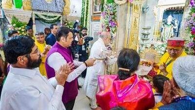 Chief minister Devendra Fadnavis accompanied union home minister Amit Shah during his visit to the Shri Lakshmi Narayan Temple in Madhavbaug on Tuesday. (CMO Maharashtra - X) Chief minister Devendra Fadnavis accompanied union home minister Amit Shah during his visit to the Shri Lakshmi Narayan Temple in Madhavbaug on Tuesday. (CMO Maharashtra - X)