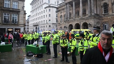 Police officers stand guard in front of the Liverpool Town Hall following an incident in Water Street (rear), on the sidelines of an open-top bus victory parade for Liverpool's Premier League title win, in Liverpool, north-west England on May 26, 2025. A car collided with a number of pedestrians in Liverpool, northern England, on May 26 evening during Liverpool FC's Premier League victory parade, police said. Police said they were contacted shortly after 6pm (1700 GMT) �following reports of a collision between a car and a number of pedestrians� in the city centre. One man has been arrested, according to the police, who did not say whether there were any casualties. (Photo by Paul ELLIS / AFP) (AFP) Police officers stand guard in front of the Liverpool Town Hall following an incident in Water Street (rear), on the sidelines of an open-top bus victory parade for Liverpool's Premier League title win, in Liverpool, north-west England on May 26, 2025. A car collided with a number of pedestrians in Liverpool, northern England, on May 26 evening during Liverpool FC's Premier League victory parade, police said. Police said they were contacted shortly after 6pm (1700 GMT) �following reports of a collision between a car and a number of pedestrians� in the city centre. One man has been arrested, according to the police, who did not say whether there were any casualties. (Photo by Paul ELLIS / AFP) (AFP)