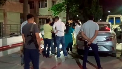 Panchkula: Police and officials investigate after seven members of a family from Dehradun allegedly consumed poison and died in a car, (PTI) Panchkula: Police and officials investigate after seven members of a family from Dehradun allegedly consumed poison and died in a car, (PTI)