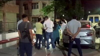 Police and officials investigating the site after seven members of a family allegedly consumed poison and died in a car in Panchkula on Monday night. (HT Photo)