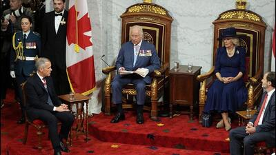 Queen Camilla and Prime Minister of Canada Mark Carney listen to King Charles III during his speech from the Throne, in the Senate Chamber at the Senate of Canada Building for the State Opening of the Parliament of Canada, in Ottawa, on Tuesday. (REUTERS) Queen Camilla and Prime Minister of Canada Mark Carney listen to King Charles III during his speech from the Throne, in the Senate Chamber at the Senate of Canada Building for the State Opening of the Parliament of Canada, in Ottawa, on Tuesday. (REUTERS)