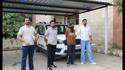 The accused in police custody.