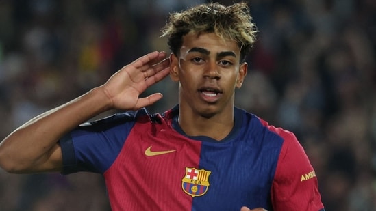 The 17-year-old Spanish football prodigy Lamine Yamal extended his contract with FC Barcelona until 2031 on Tuesday, announced the Catalan club on May 27, 2025. (AFP)