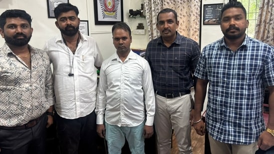 The Mumbai police have taken into custody the suspect (in the centre) who allegedly made a bomb threat to Mumbai airport (ANI/X)