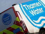 Signage is seen on a Thames Water service vehicle, in London, Britain