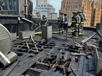 Boston firefighters evacuated residents, and a second alarm was raised for extra assistance. Boston firefighters evacuated residents, and a second alarm was raised for extra assistance.