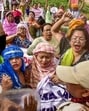 Security personnel attempt to stop agitators from reaching the DC office during their protest demanding an apology from Manipur Governor Ajay Kumar Bhalla (PTI)