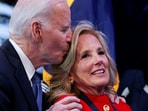 Former President Joe Biden kisses Jill Biden after she received a Department of Defense medal for Distinguished Public Service
