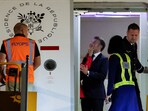 Macron dismissed having a "domestic dispute" with his wife, telling reporters that they were "joking, as we often do."