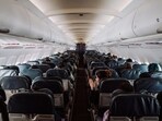 One country plans to issue fines to travellers who crowd the aisles after landing