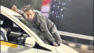 Enraged cabbie carries fellow driver on speeding car’s bonnet for 6km Enraged cabbie carries fellow driver on speeding car’s bonnet for 6km
