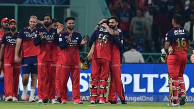 Virat Kohli of (RCB) Royal Challengers Bangalore and teammates congratulate Jitesh Sharma for his winning runs (Hindusan Times)