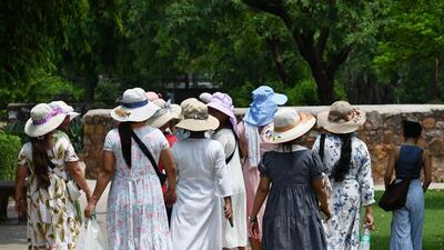 A group of women don hats on a sunny afternoon, at Qutub Minar. (Vipin Kumar/HT Photo) A group of women don hats on a sunny afternoon, at Qutub Minar. (Vipin Kumar/HT Photo)