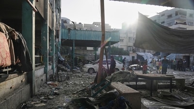 Palestinians inspect the damage at school used as a shelter by displaced residents that was hit by Israeli military strike and killed at least 36 people, in Gaza City, on Monday, May 26, 2025. (AP) Palestinians inspect the damage at school used as a shelter by displaced residents that was hit by Israeli military strike and killed at least 36 people, in Gaza City, on Monday, May 26, 2025. (AP)