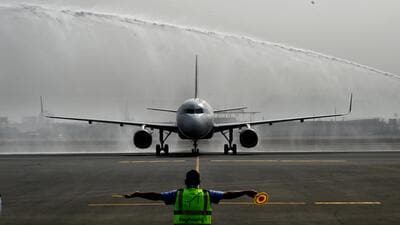 Navi Mumbai, India - Dec. 29, 2024:First commercial aircraft landing on the runway of Navi Mumbai International Airport Ltd at Ulwe in Navi Mumbai, India, on Sunday, December 29, 2024. (Photo by Bachchan Kumar/ HT PHOTO) (HT PHOTO) Navi Mumbai, India - Dec. 29, 2024:First commercial aircraft landing on the runway of Navi Mumbai International Airport Ltd at Ulwe in Navi Mumbai, India, on Sunday, December 29, 2024. (Photo by Bachchan Kumar/ HT PHOTO) (HT PHOTO)