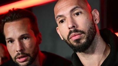 UK prosecutors have authorized 21 charges against Andrew and Tristan Tate. (Photo by Daniel MIHAILESCU / AFP) (AFP)