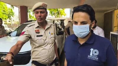 Sonipat: Ashoka University professor Ali Khan Mahmudabad being escorted by police personnel after his arrest in Sonipat on May 18. (PTI) Sonipat: Ashoka University professor Ali Khan Mahmudabad being escorted by police personnel after his arrest in Sonipat on May 18. (PTI)