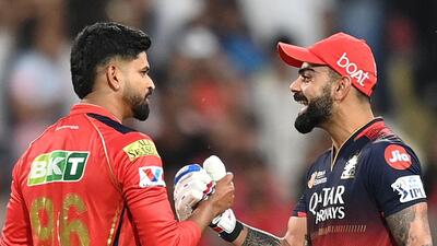 TOPSHOT - Royal Challengers Bengaluru's Virat Kohli (R) is congratulated by Punjab Kings' captain Shreyas Iyer after their win at the end of the Indian Premier League (IPL) Twenty20 cricket match between Punjab Kings and Royal Challengers Bengaluru at the Maharaja Yadavindra Singh International Cricket Stadium on the outskirts of Chandigarh on April 20, 2025. (Photo by Shammi MEHRA / AFP) / -- IMAGE RESTRICTED TO EDITORIAL USE - STRICTLY NO COMMERCIAL USE -- (AFP) TOPSHOT - Royal Challengers Bengaluru's Virat Kohli (R) is congratulated by Punjab Kings' captain Shreyas Iyer after their win at the end of the Indian Premier League (IPL) Twenty20 cricket match between Punjab Kings and Royal Challengers Bengaluru at the Maharaja Yadavindra Singh International Cricket Stadium on the outskirts of Chandigarh on April 20, 2025. (Photo by Shammi MEHRA / AFP) / -- IMAGE RESTRICTED TO EDITORIAL USE - STRICTLY NO COMMERCIAL USE -- (AFP)