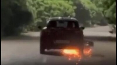 The clip, recorded in the Sushant Golf City area, purportedly shows a two-wheeler stuck under a moving car, with sparks flying as it is pulled along the road. (Sourced)