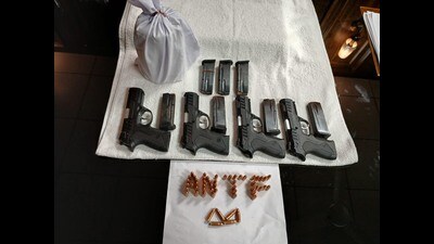 The weapons recovered by the Amritsar police from the smugglers. (HT Photo) The weapons recovered by the Amritsar police from the smugglers. (HT Photo)